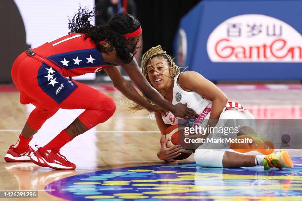 Arella Guirantes of Puerto Rico competes for the ball with Kahleah Copper of the United States during the 2022 FIBA Women's Basketball World Cup...