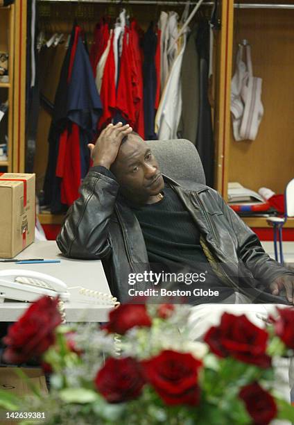 Red Sox player Adrian Brown in the Red Sox clubhouse following an early morning loss to the NY Yankees in game 7 of the ALCS. Roses were a gift to...