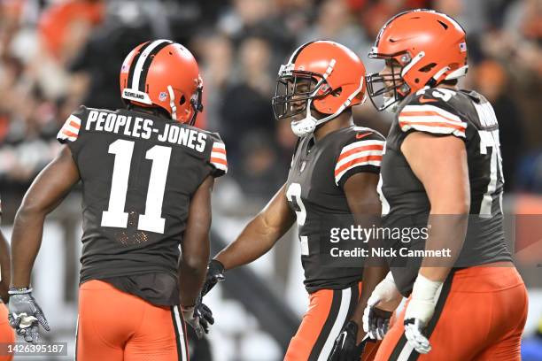 Amari Cooper of the Cleveland Browns celebrates his touchdown during the first quarter alongside Donovan Peoples-Jones Jack Conklin against the...