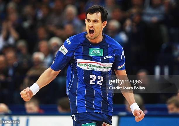 Marcin Lijewski of Hamburg celebrates during the Toyota Bundesliga handball game between HSV Hamburg and Rhein-Neckar Loewen at the O2 World on April...