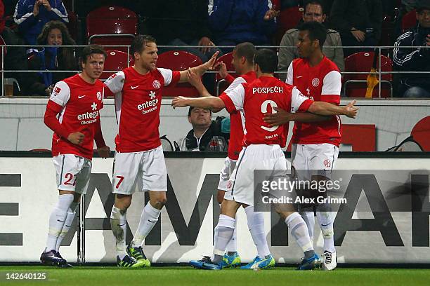 Eugen Polanski celebrates his team's first goal with team mates during the Bundesliga match between between FSV Mainz 05 and 1. FC Koeln at Coface...