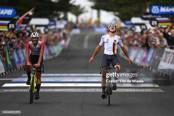 Emil Herzog of Germany celebrates at finish line as race winner ahead of António Morgado of Portugal during the 95th UCI Road World Championships...