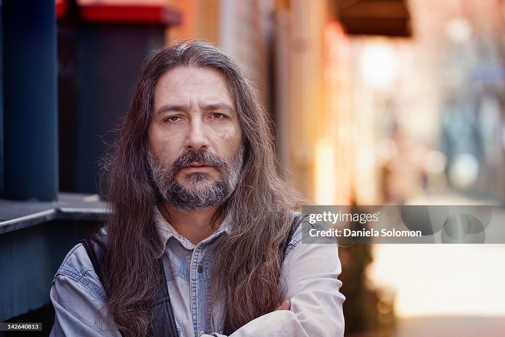 Close up of man with long hair and beard