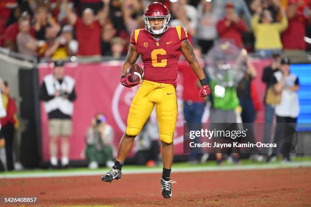 Running back Austin Jones of the USC Trojans celebrates after a touchdown in the game against the Fresno State Bulldogs at United Airlines Field at...