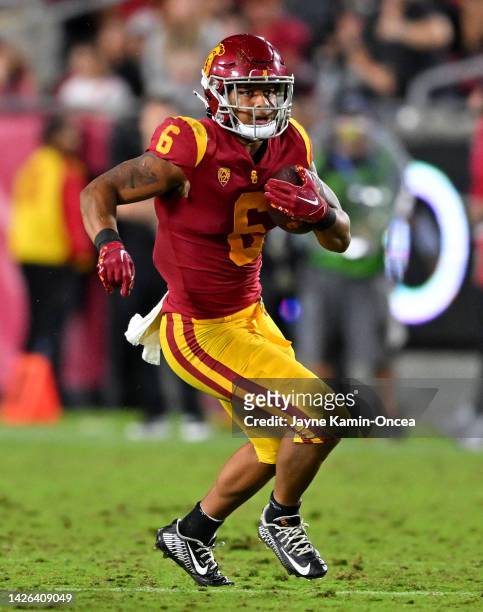 Running back Austin Jones of the USC Trojans carries the ball for a first down in the game against the Fresno State Bulldogs at United Airlines Field...