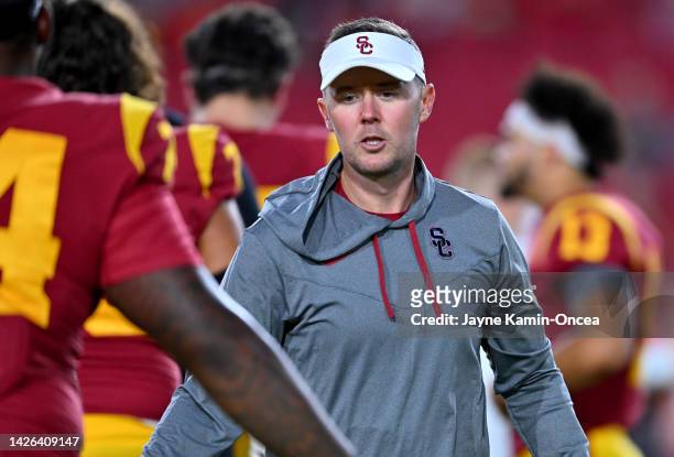 Head coach Lincoln Riley of the USC Trojans greets players during the game against the Fresno State Bulldogs at United Airlines Field at the Los...