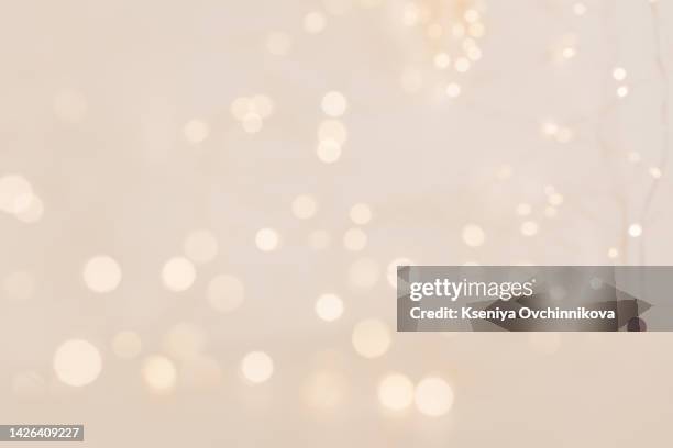 blurred view of beautiful christmas lights, bokeh effect - gold medalist stock pictures, royalty-free photos & images