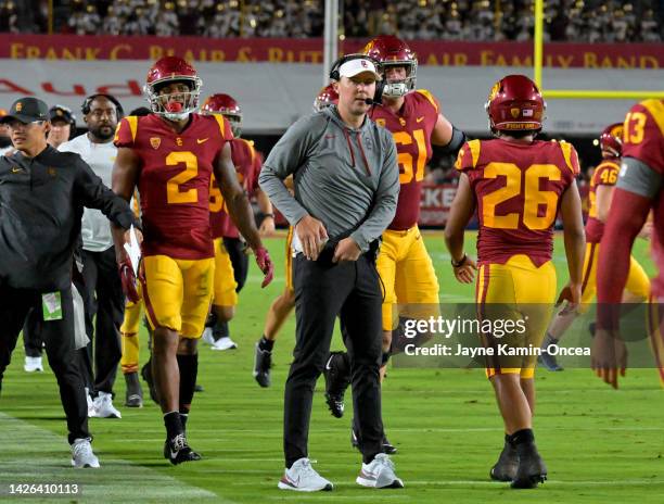 Head coach Lincoln Riley of the USC Trojans greets players after a touchdown in the game against the Fresno State Bulldogs at United Airlines Field...