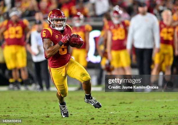 Running back Austin Jones of the USC Trojans carries the ball for a first down in the game against the Fresno State Bulldogs at United Airlines Field...