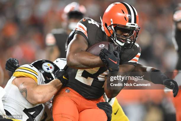 Nick Chubb of the Cleveland Browns carries during the third quarter ahead of Robert Spillane of the Pittsburgh Steelers at FirstEnergy Stadium on...