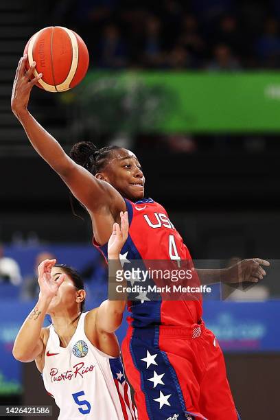 Jewel Loyd of the United States wins the ball ahead of Pamela Rosado of Puerto Rico during the 2022 FIBA Women's Basketball World Cup Group A match...