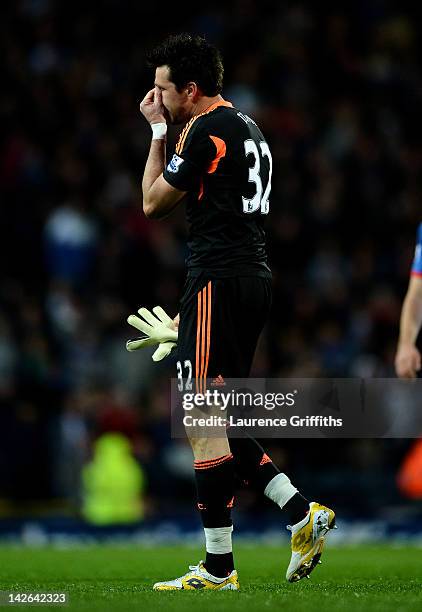 Alexander Doni of Liverpool heads for the dressing room after being sent off during the Barclays Premier League match between Blackburn Rovers and...