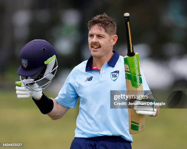 Daniel Hughes of NSW is pictured celebrating making a century during the Marsh One Day Cup match between Victoria and New South Wales at CitiPower...