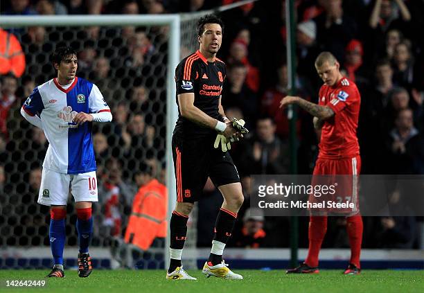Alexander Doni of Liverpool heads for the dressing room after being sent off during the Barclays Premier League match between Blackburn Rovers and...
