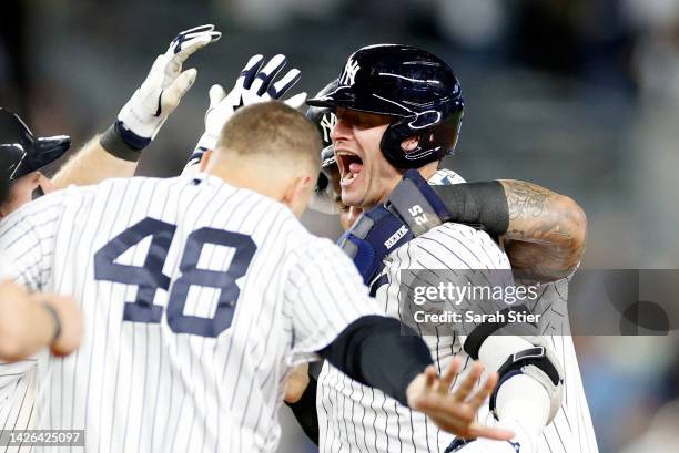 Josh Donaldson of the New York Yankees reacts after hitting a walk-off single during the tenth inning against the Boston Red Sox at Yankee Stadium on...