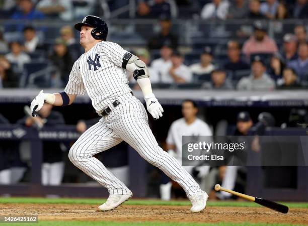 Josh Donaldson of the New York Yankees drives in the game winning run in the 10th inning against the Boston Red Sox at Yankee Stadium on September...