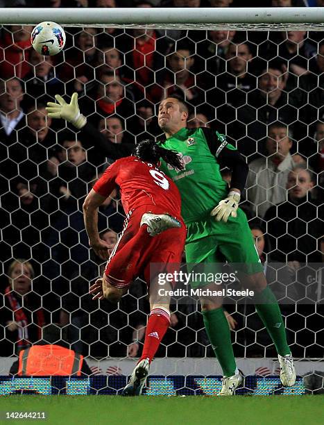 Paul Robinson of Blackburn Rovers is unable to stop Andy Carroll of Liverpool scoring the winning goal during the Barclays Premier League match...