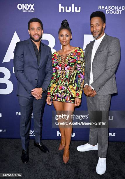 Micheal Ealy, Emayatzy Corinealdi and McKinley Freeman attend the Premiere of Hulu's "Reasonable Doubt" at NeueHouse Hollywood on September 22, 2022...