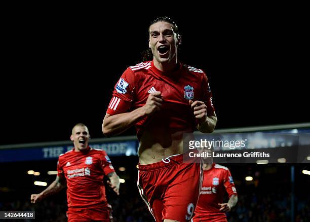 Andy Carroll of Liverpool celebrates scoring the winning goal during the Barclays Premier League match between Blackburn Rovers and Liverpool at...