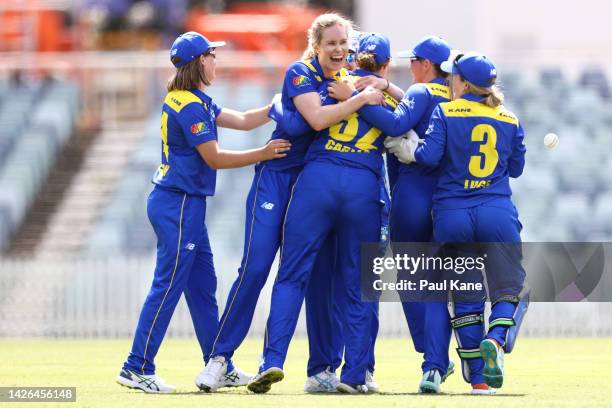 Holly Ferling of the ACT Meteors celebrates the wicket of Beth Mooney of Western Australia during the WNCL match between Western Australia and...