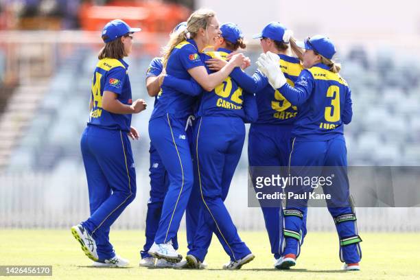 Holly Ferling of the ACT Meteors celebrates the wicket of Beth Mooney of Western Australia during the WNCL match between Western Australia and...