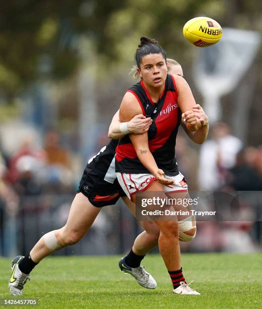 Madison Prespakis of Essendon handballs during the round five AFLW match between the Collingwood Magpies and the Essendon Bombers at AIA Centre on...