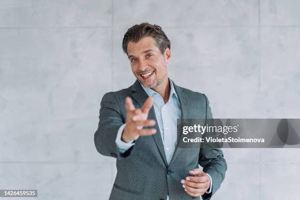 businessman talking during video call in the office. - presenter isolated stock pictures, royalty-free photos & images