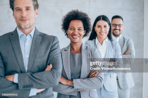 equipo de negocios exitoso. - businesswear fotografías e imágenes de stock