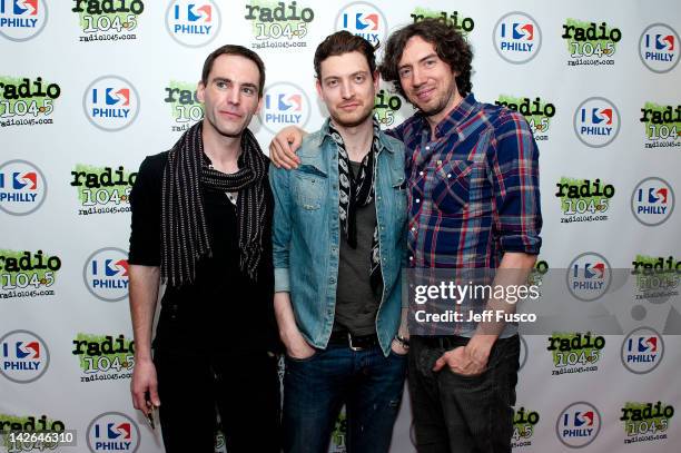 Paul Wilson, Nathan Connolly and Gary Lightbody of Snow Patrol pose at the Radio 104.5 iHeart Performance Theater on April 10, 2012 in Bala Cynwyd,...