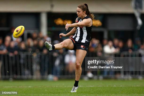 Chloe Molloy of Collingwood kicks the ball during the round five AFLW match between the Collingwood Magpies and the Essendon Bombers at AIA Centre on...