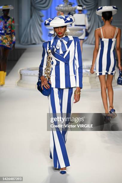 Model walks the runway during the Moschino Ready to Wear Spring/Summer 2023 fashion show as part of the Milan Fashion Week on September 22, 2022 in...