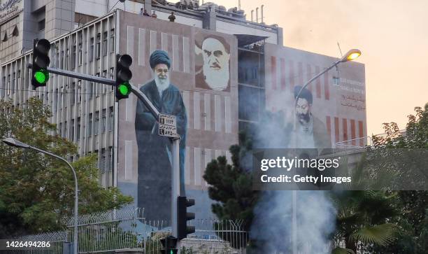 People gather in protest against the death of Mahsa Amini along the streets on September 19, 2022 in Tehran, Iran. 22-year-old Mahsa Amini fell into...