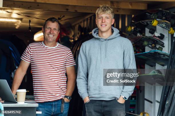 team behind the business - dad and son stock pictures, royalty-free photos & images