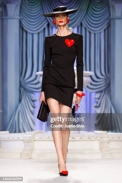 Model walks the runway of the Moschino Fashion Show during the Milan Fashion Week Womenswear Spring/Summer 2023 on September 22, 2022 in Milan, Italy.