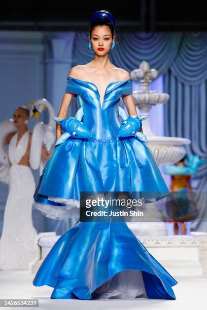 Model walks the runway of the Moschino Fashion Show during the Milan Fashion Week Womenswear Spring/Summer 2023 on September 22, 2022 in Milan, Italy.