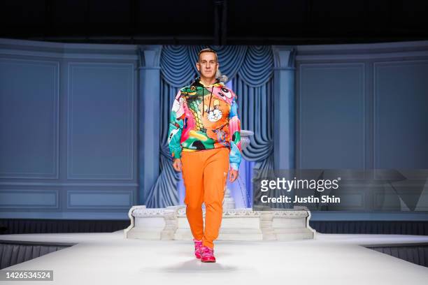 Fashion designer Jeremy Scott walks the runway of the Moschino Fashion Show during the Milan Fashion Week Womenswear Spring/Summer 2023 on September...