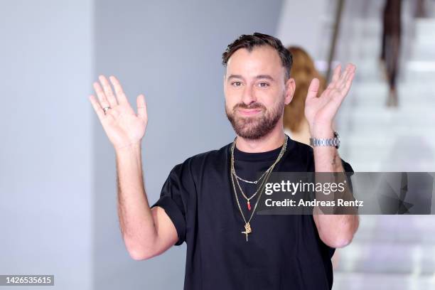 Fashion designer Filippo Grazioli acknowledges the applause of the audience at the Missoni Fashion Show during the Milan Fashion Week Womenswear...