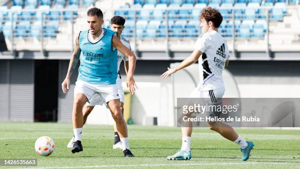 Dani Ceballos and Alvaro Odriozola players of Real Madrid take part in training session at Valdebebas training ground on September 23, 2022 in...