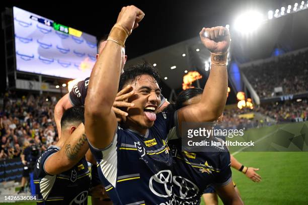 Murray Taulagi of the Cowboys celebrates with team mates after scoring a try during the NRL Preliminary Final match between the North Queensland...