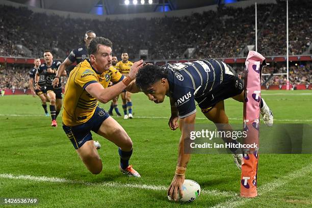 Murray Taulagi of the Cowboys scores a try during the NRL Preliminary Final match between the North Queensland Cowboys and the Parramatta Eels at...
