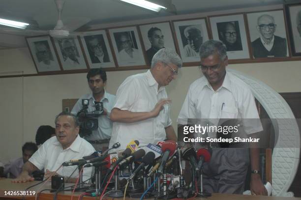 Communist Party of India - Marxist General Secretary Prakash Karat with Communist Party of India leader D Raja during a meeting in New Delhi.