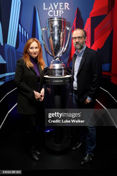 Rowling poses for a photograph with the Laver Cup trophy alongside husband Neil Murray during Day One of the Laver Cup at The O2 Arena on September...