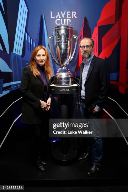 Rowling poses for a photograph with the Laver Cup trophy alongside husband Neil Murray during Day One of the Laver Cup at The O2 Arena on September...