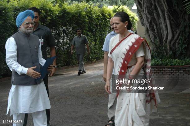Prime Minister Manmohan Singh with Congress President Sonia Gandhi at her residence in New Delhi.