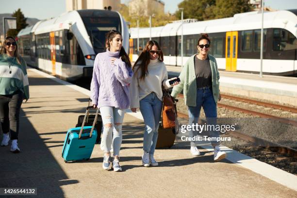 Friends Catching Train Friendship Train Photos and Premium High Res Pictures - Getty Images