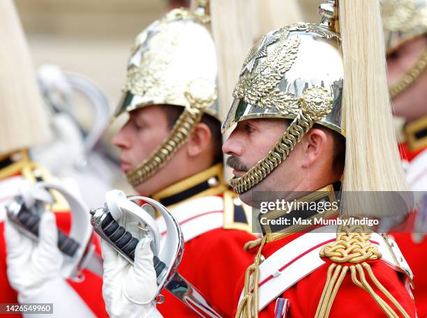 Moustachioed Life Guards soldier of The Household Cavalry Mounted Regiment forms part of a Guard of Honour at the Committal Service for Queen...