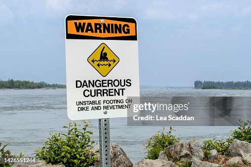 Current Warning Dangerous Current Warning Sign High-Res Stock Photo - Getty Images