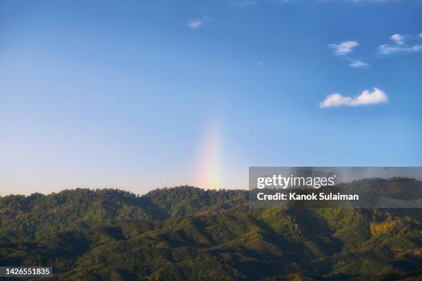 rainbow after a storm on a blue sky over forest on mountain - rainbow forrest abstract bildbanksfoton och bilder