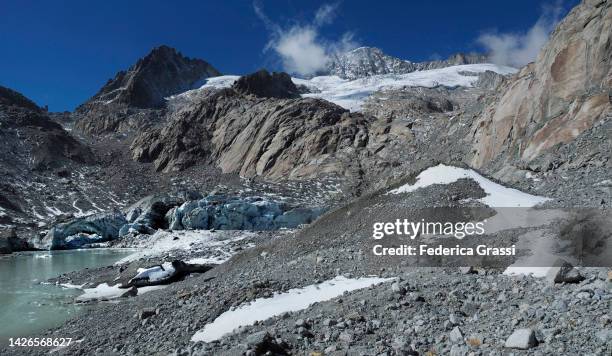 ice natural arch at the glacier mouth of tiefengletscher along the famous "nepali highway" in switzerland - scree stock pictures, royalty-free photos & images