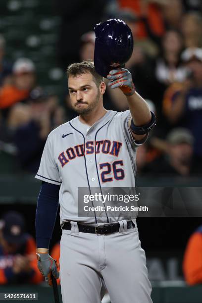 Trey Mancini of the Houston Astros acknowledges the crowd during his first at bat against the Baltimore Orioles during the second inning at Oriole...